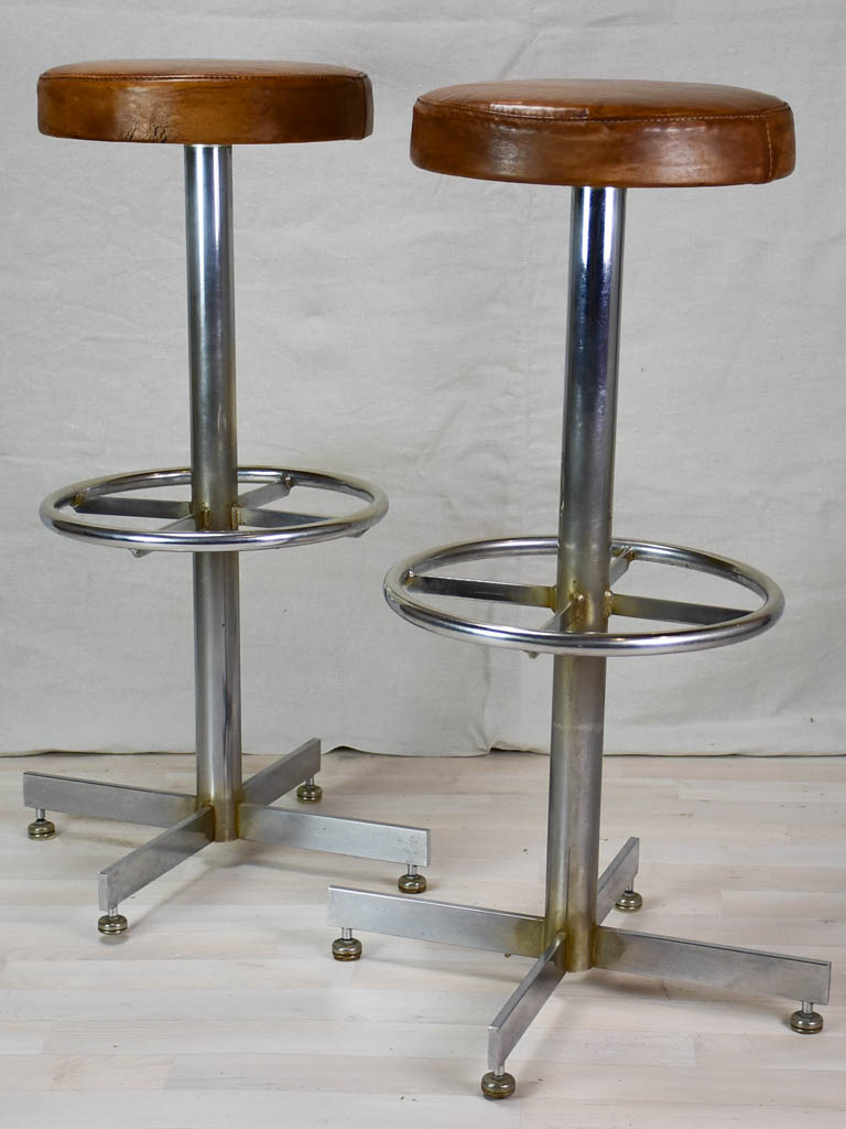 Pair of vintage French bar stools with leather seats 33¾"