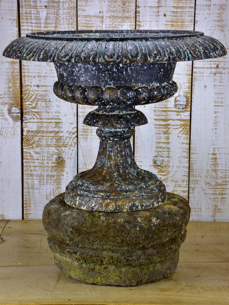 Large antique French medici urn mounted on a stone pedestal