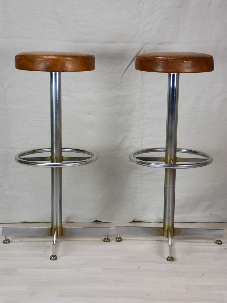 Pair of vintage French bar stools with leather seats 33¾"