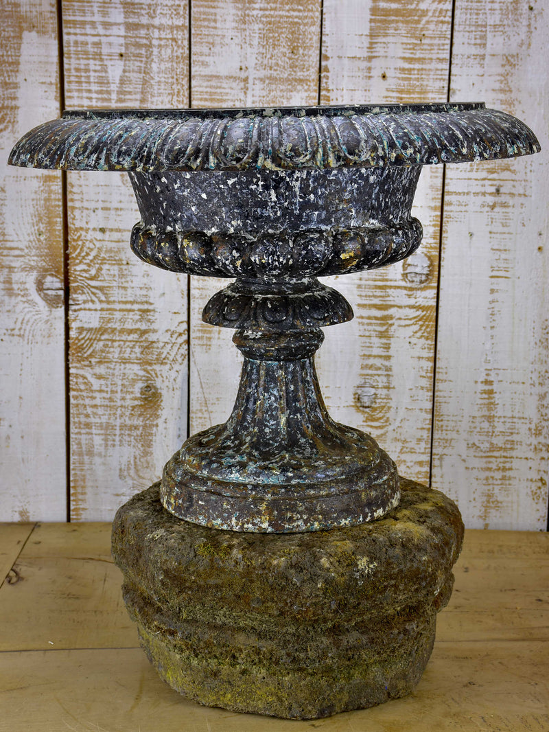 Large antique French medici urn mounted on a stone pedestal