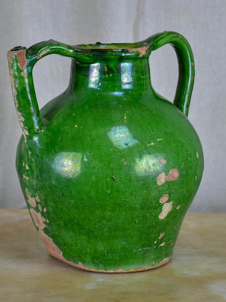 Antique French water jug with green glaze
