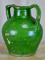 Antique French water jug with green glaze