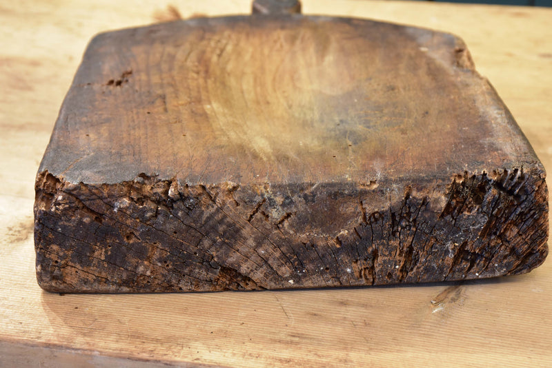 Cutting board with curved top