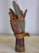Mid-century wooden articulated hand with metal mesh glove