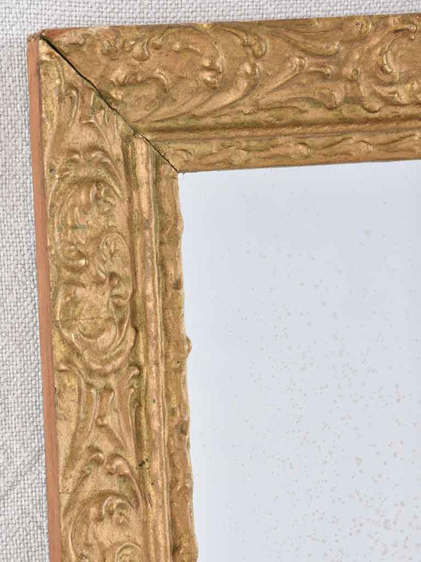 Antique gilded timber-framed decorative mirror