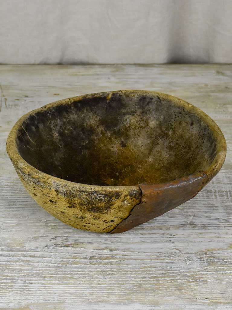 Primitive wooden bowl from south west France with repairs