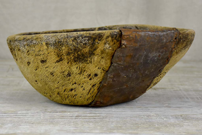 Primitive wooden bowl from south west France with repairs