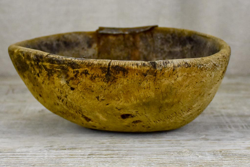 Primitive wooden bowl from south west France with repairs