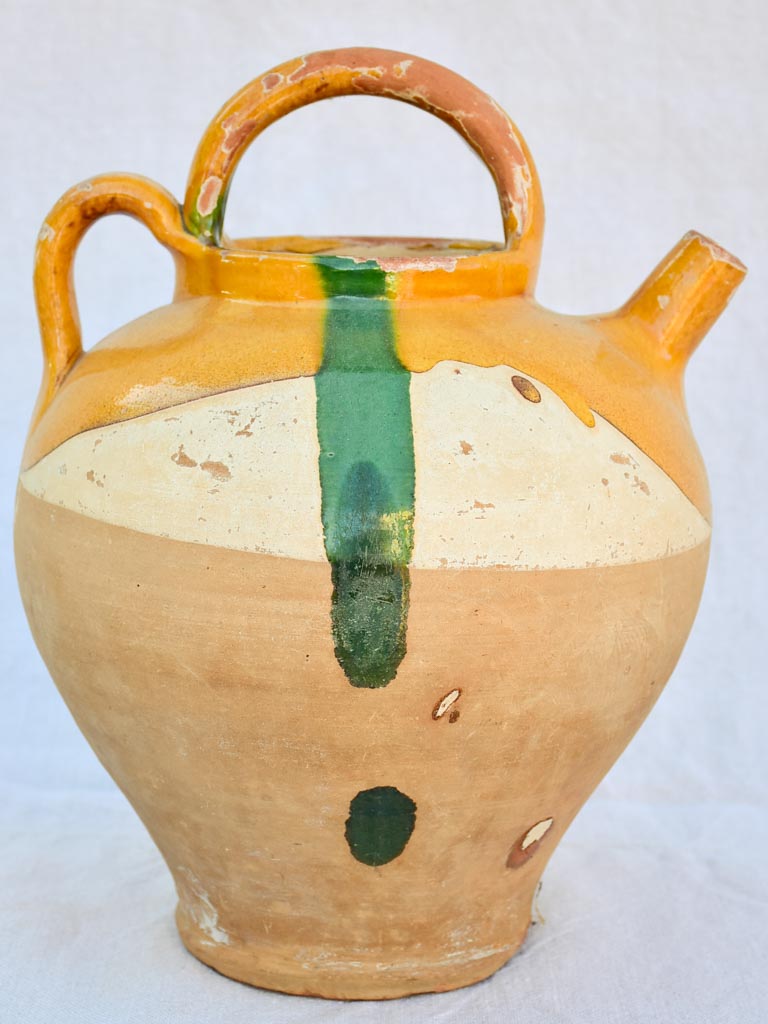 Antique French water pitcher with yellow glaze and green splash 12½"