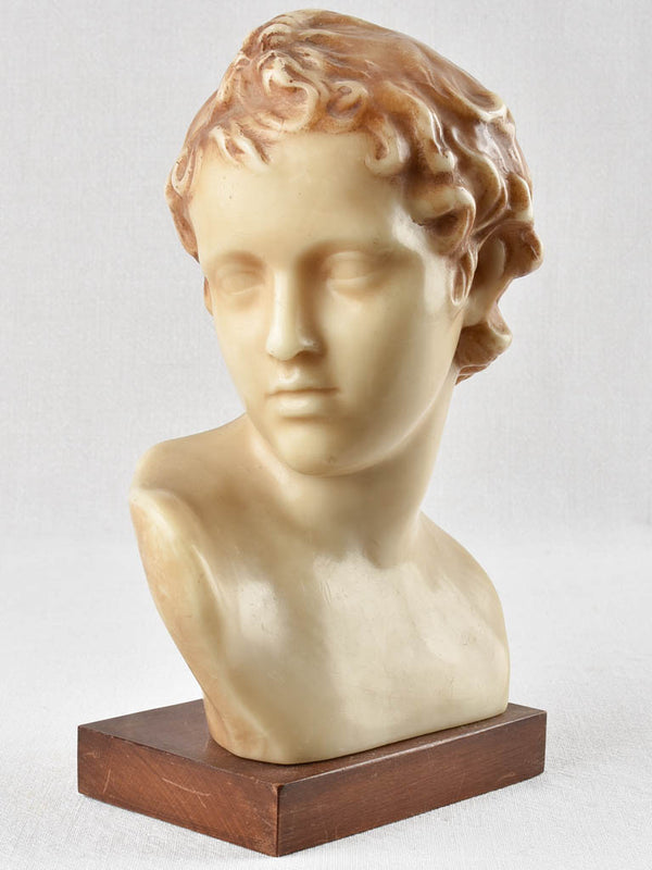 Vintage wax bust on wooden stand