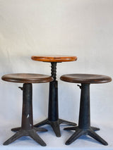 Collection of three sewing stools with cast iron bases "Singer"