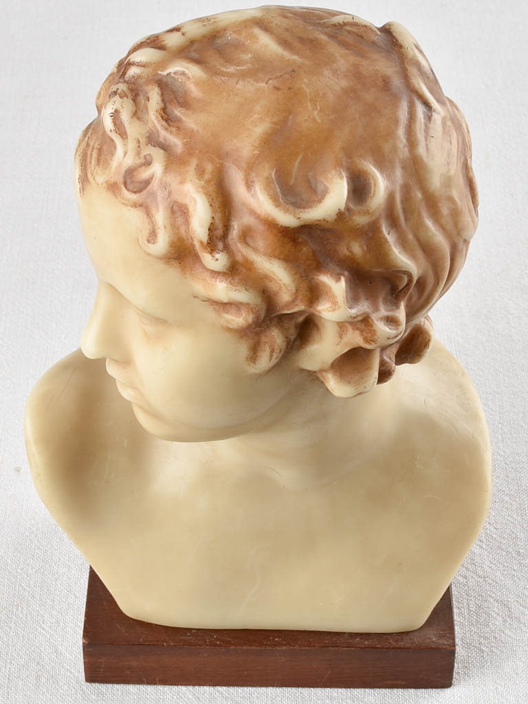 Dated wax bust with timber stand