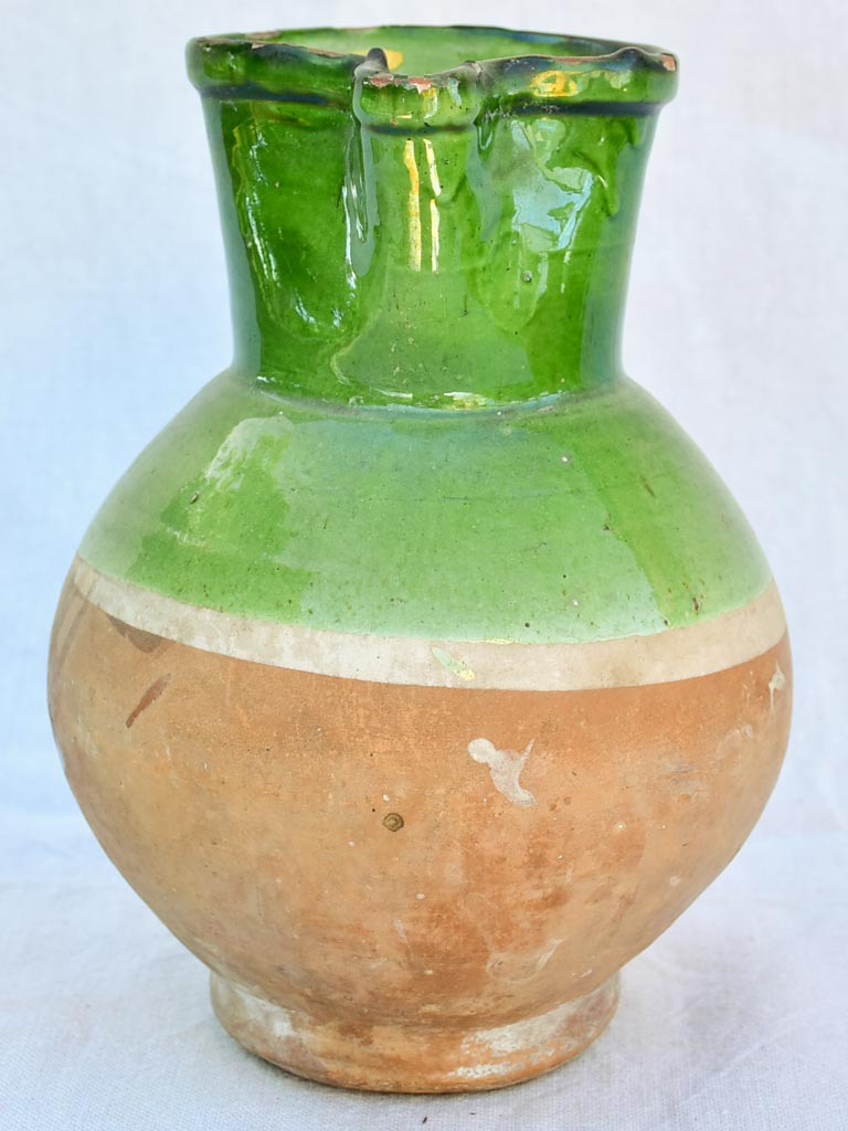 Antique French water pitcher with green glaze and pinched beak 10¼"