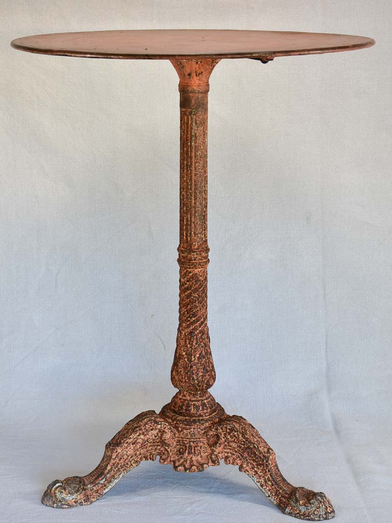 Nineteenth-century French garden table with salmon red patina