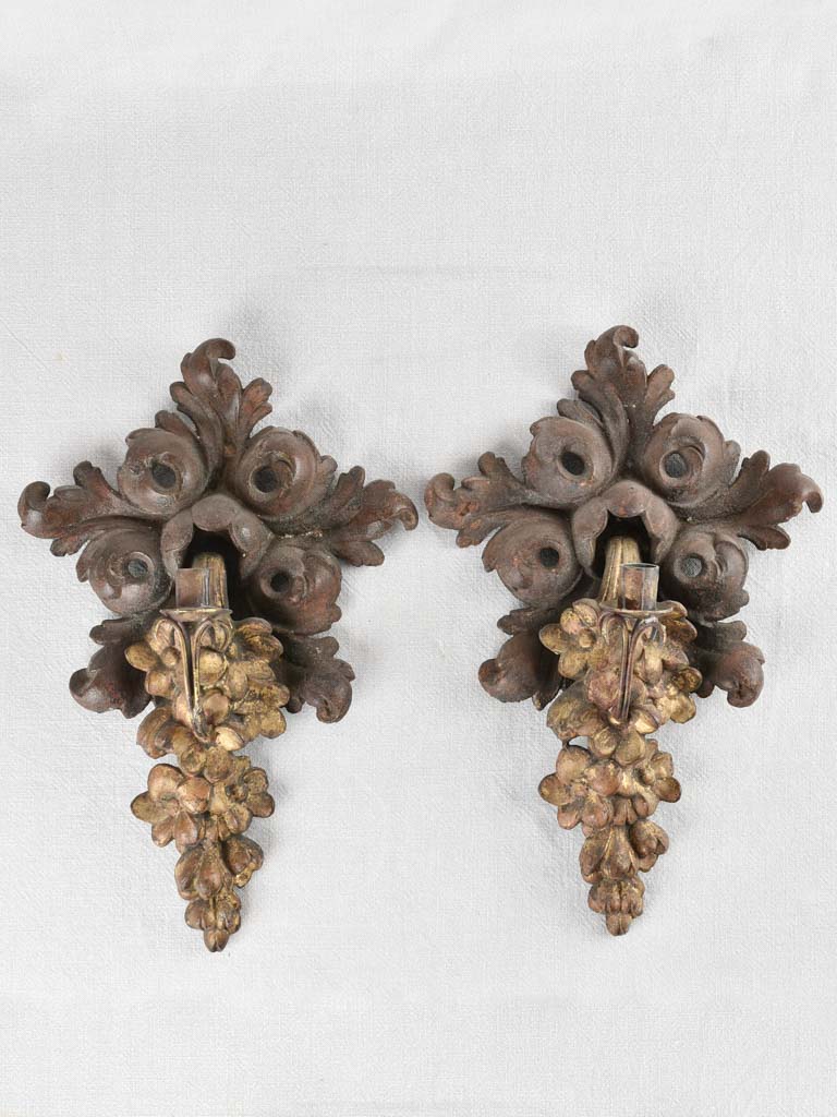 Pair of cast iron candle appliques 17"