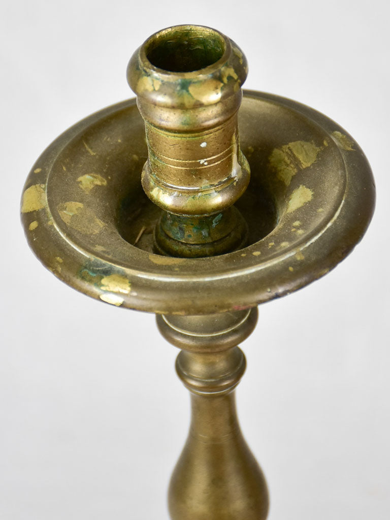 Unique antique bronze candlestick pair