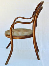 Antique French children's bentwood and cane armchair
