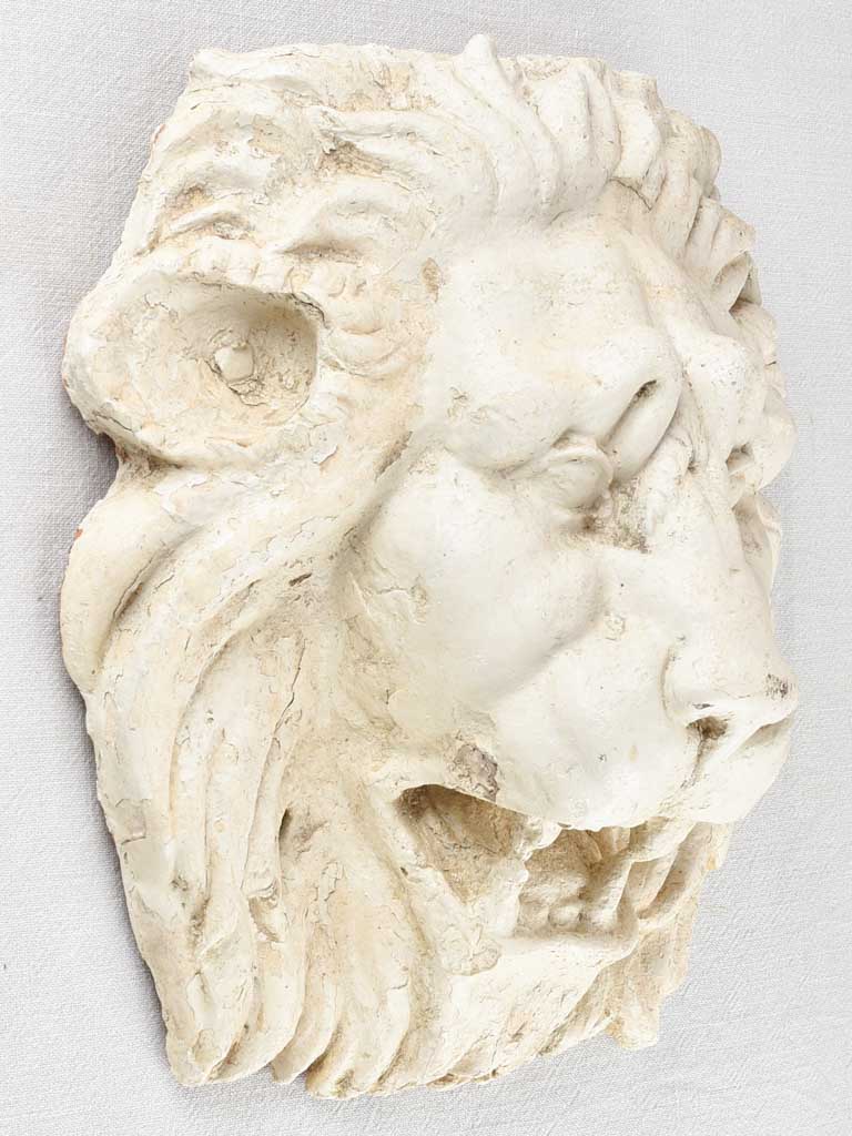 White painted teracotta lion's head