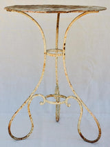 Early twentieth century French garden table with looped base 20¾"