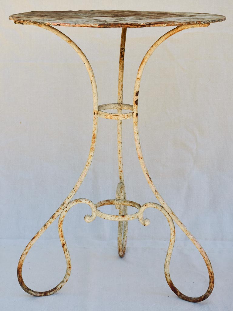 Early twentieth century French garden table with looped base 20¾"