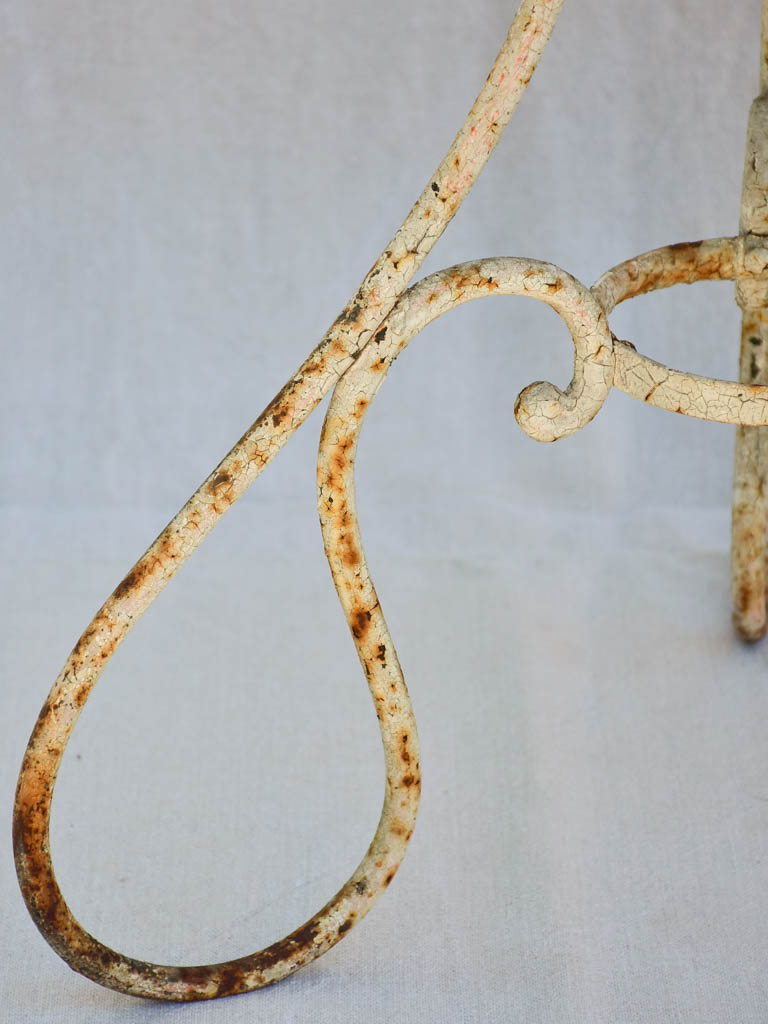 Early twentieth century French garden table with looped base 20¾"