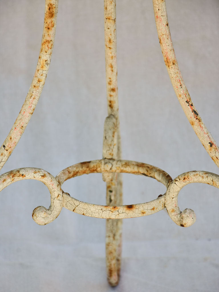 Early twentieth century French garden table with looped base 20¾"