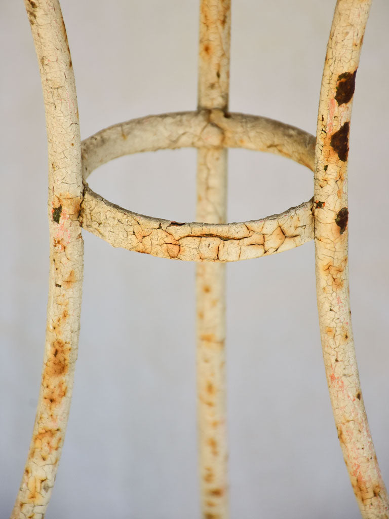 Early twentieth century French garden table with looped base 20¾"