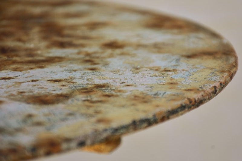 Early twentieth century French garden table with looped base 20¾"