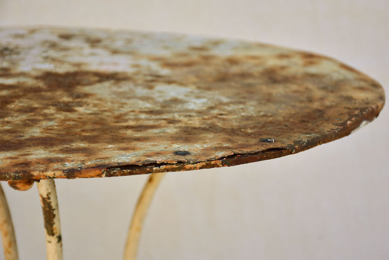 Early twentieth century French garden table with looped base 20¾"