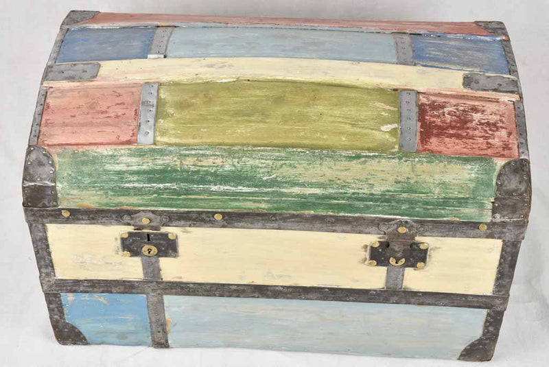 Eclectic painted old storage trunk