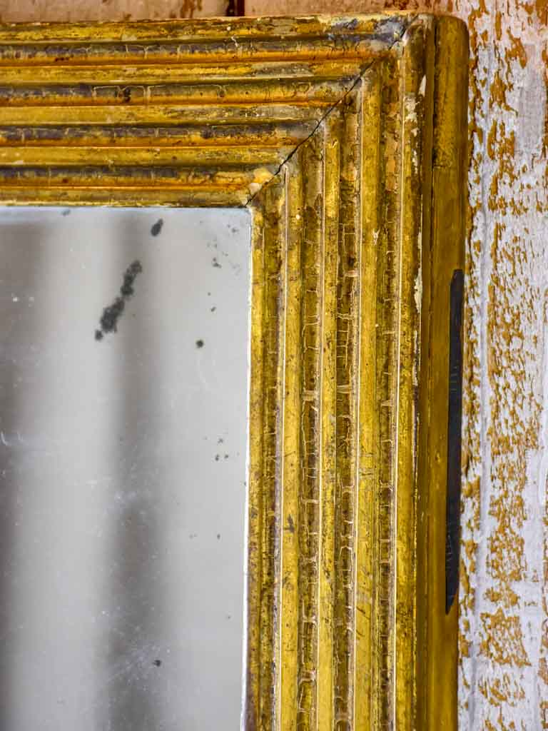 Small rectangular 18th Century Louis XVI mirror with gilded frame