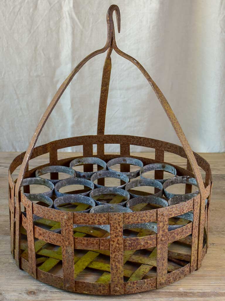 Large antique French bottle holder for a well