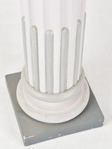 Elegant, column-shaped timber pedestal