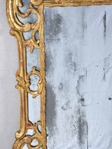 Large 18th century French gilt mirror with flower basket pediment 29½"x 59½"