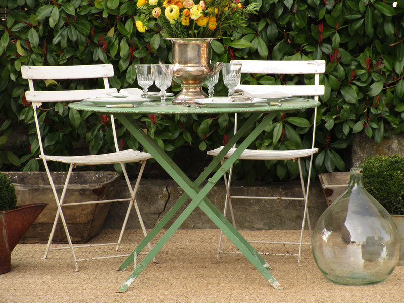 Round green folding bistro table - four person