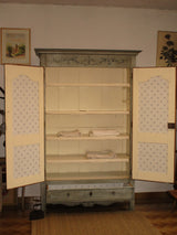 Five open shelves of an 18th century Louis XV painted marriage armoire