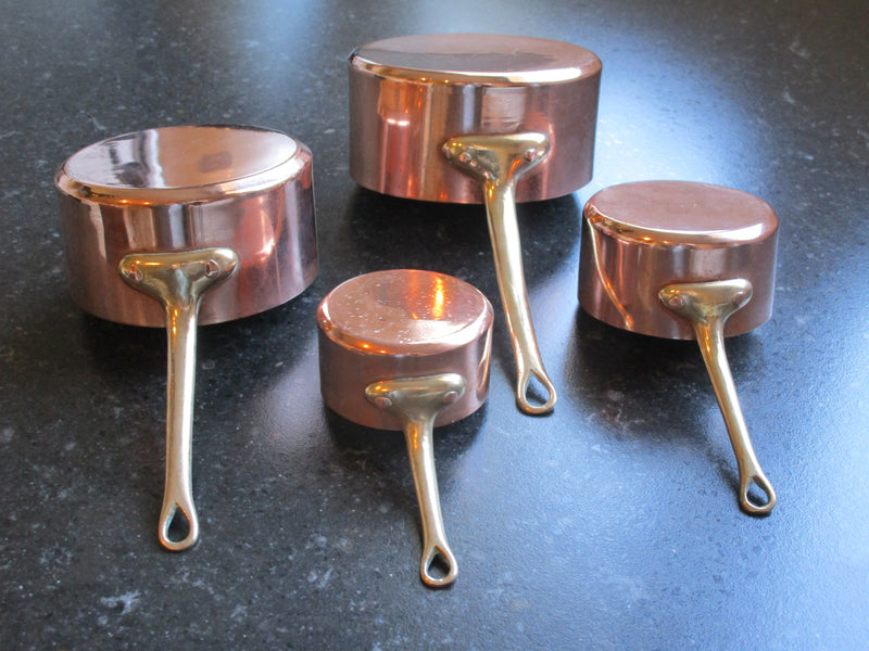 Set of four chefs miniature copper saucepans