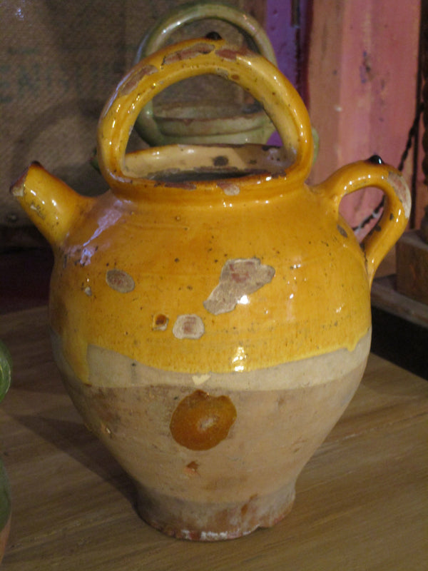 Provencal water jug with orange glaze 10½"