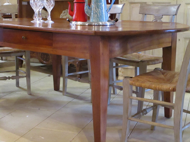 rustic oval dining table in walnut six person