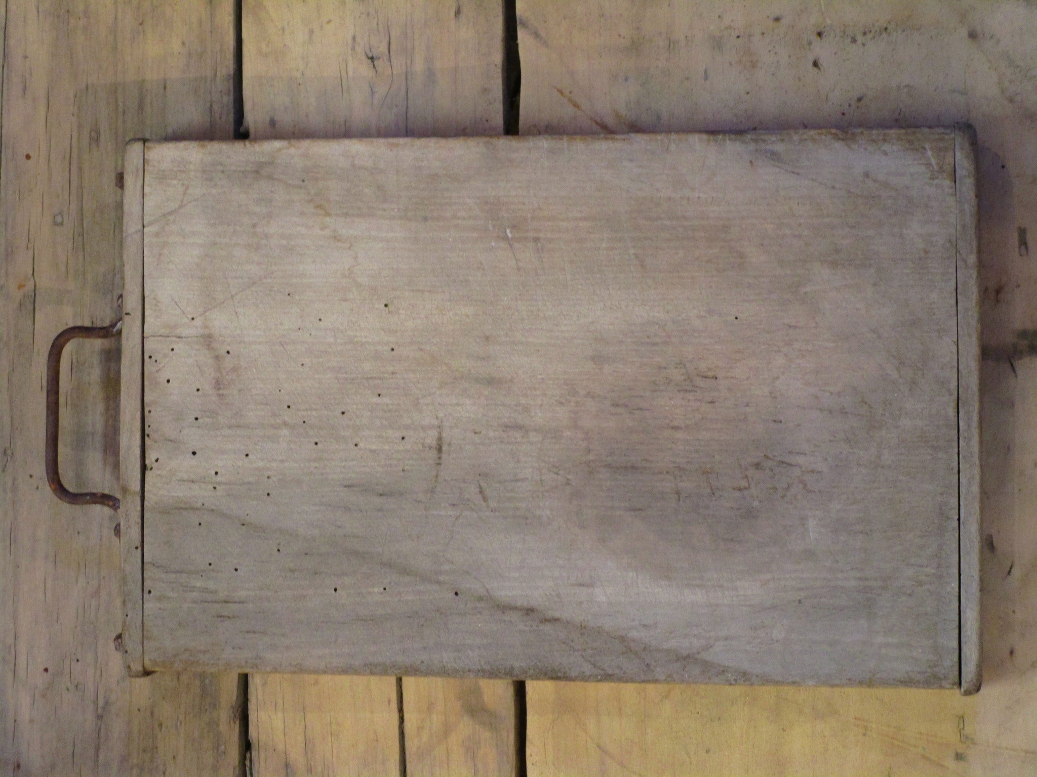 Rustic French chopping board with iron handle