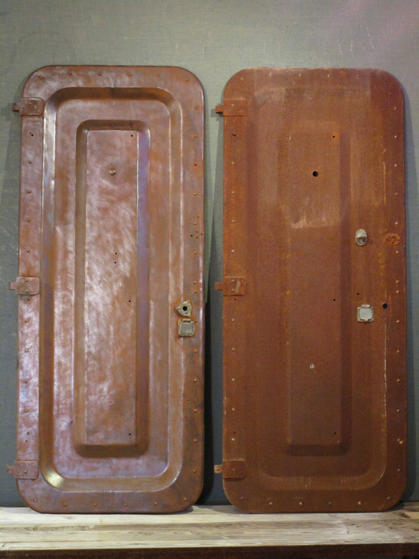 Pair of antique rustic metal boat doors