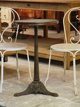 Round Parisian cafe marble top table