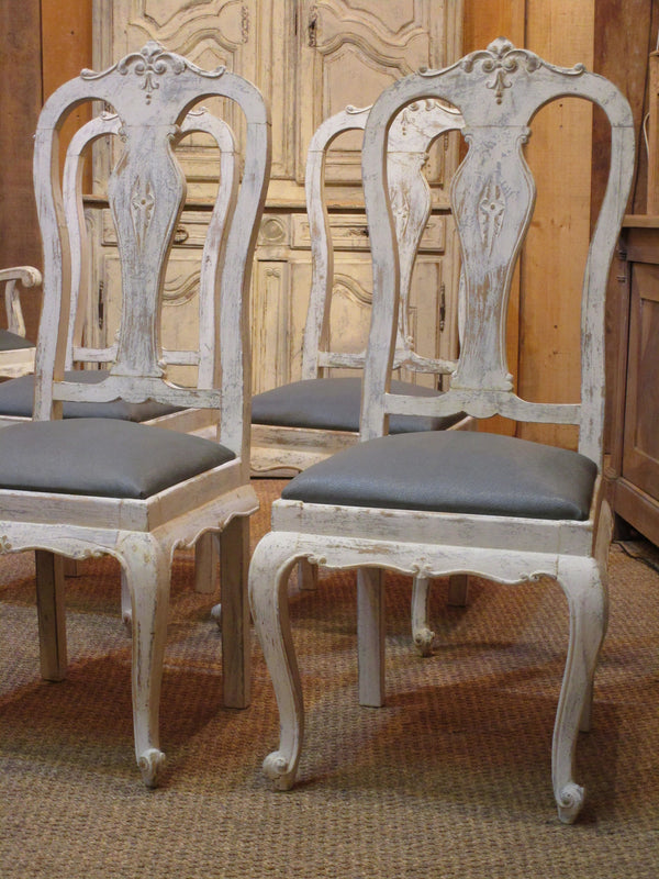 Set of four oak Chippendale dining chairs