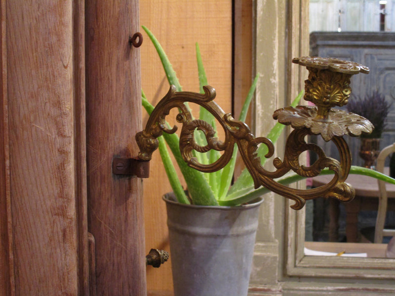 Bronze candlestick detail - French oak modesty mirror with 