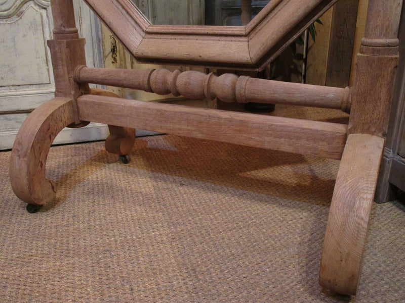 Pivoting base detail - French oak modesty mirror with bronze candlesticks