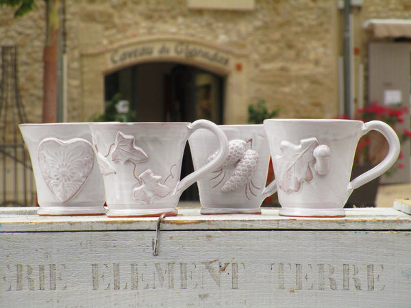four glazed mugs bespoke french heart pinecone acorn vine