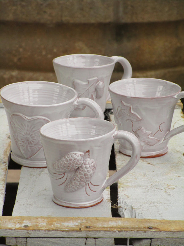 four glazed tea cups handmade in france