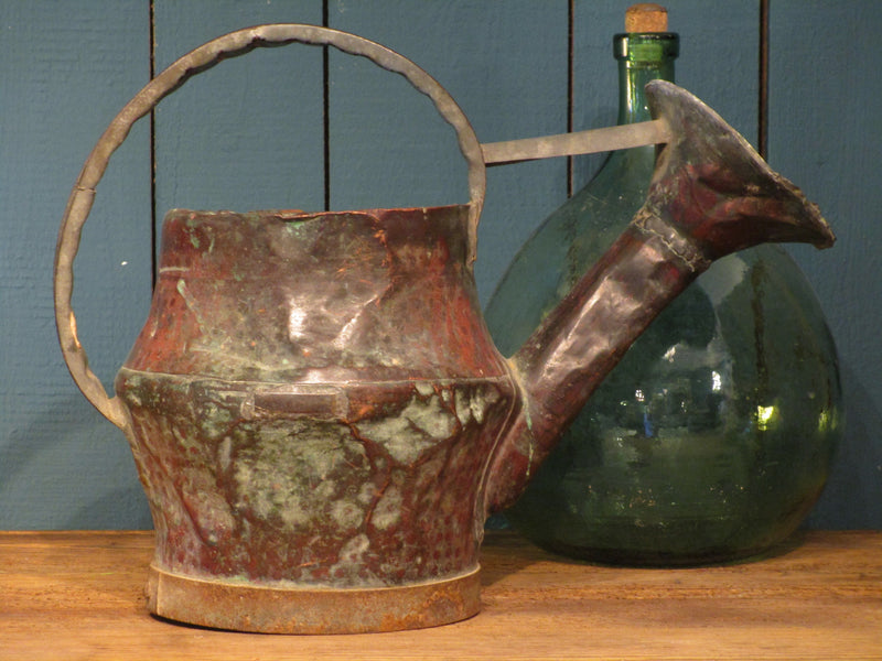 side view ancient rustic french watering can