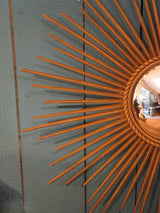 round french sunburst mirror with convex glass and gold spokes