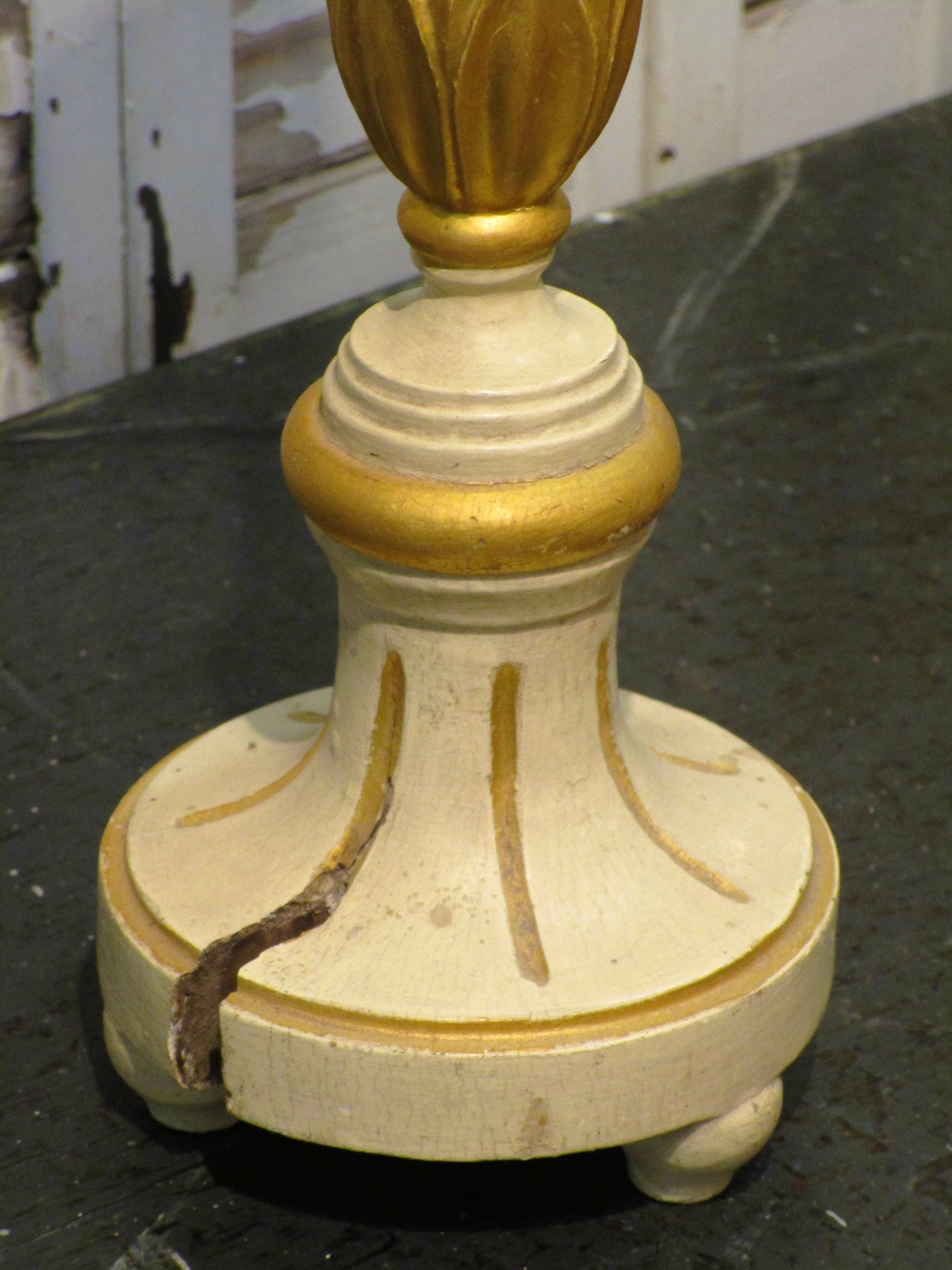 Antique carved candlestick with pineapple top